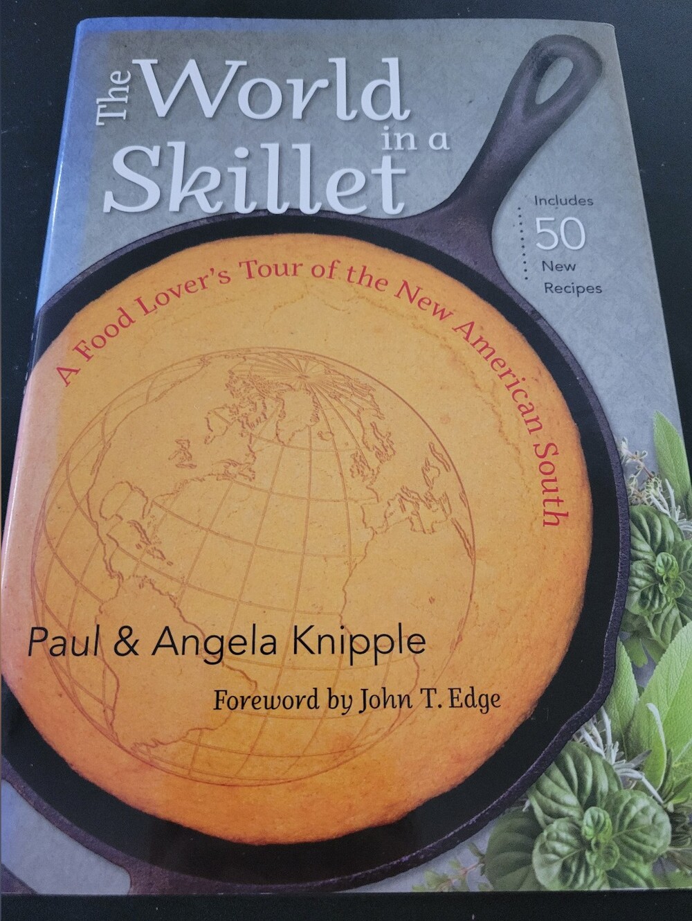 The World in a Skillet - (Gray/Black Cover)